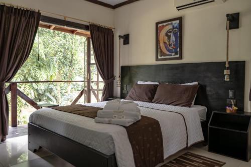 Ein Bett oder Betten in einem Zimmer der Unterkunft Terra Luna Lodge