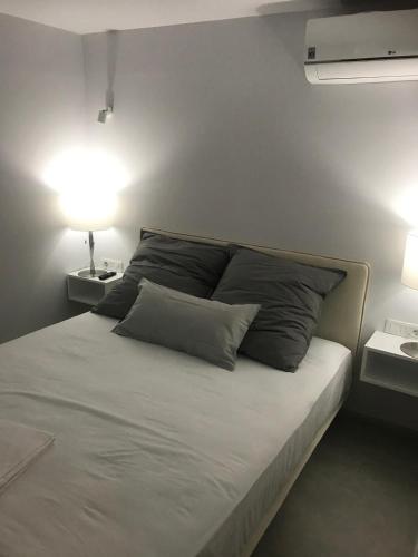 Postel nebo postele na pokoji v ubytování Lux Beach House M