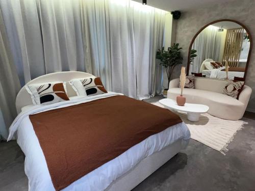 Ένα ή περισσότερα κρεβάτια σε δωμάτιο στο Spa - Sauna privatif plein centre