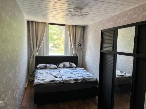 Säng eller sängar i ett rum på Wohnung im Zentrum 70 qm