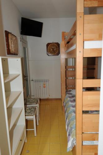 Habitación pequeña con litera y litera en Appartamento Palmira, en Roma