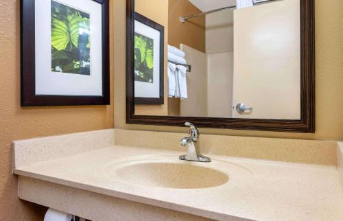 a bathroom with a sink and a mirror at Extended Stay America Suites - Cincinnati - Florence - Turfway Rd in Florence