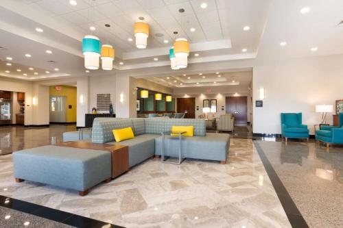 a lobby of a hospital with a couch and chairs at Drury Inn & Suites Colorado Springs Near the Air Force Academy in Colorado Springs