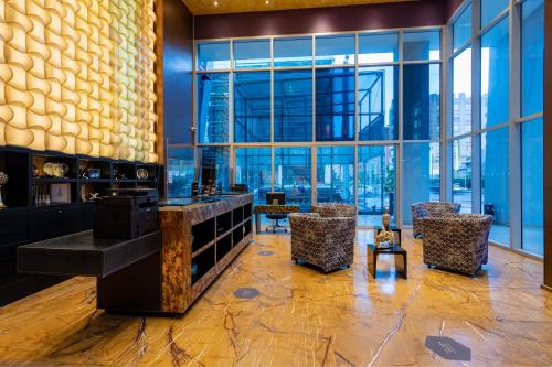 a hotel lobby with a view of the city at Four Points By Sheraton Bogota in Bogotá