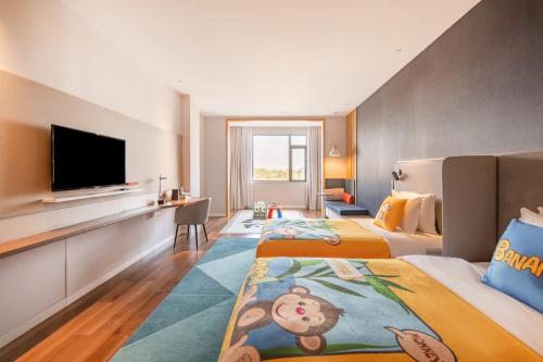 Postel nebo postele na pokoji v ubytování Holiday Inn Express Shanghai Jiading New City by IHG