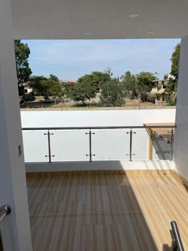 a view of a room with a large window at Hurin Hotel in Ica