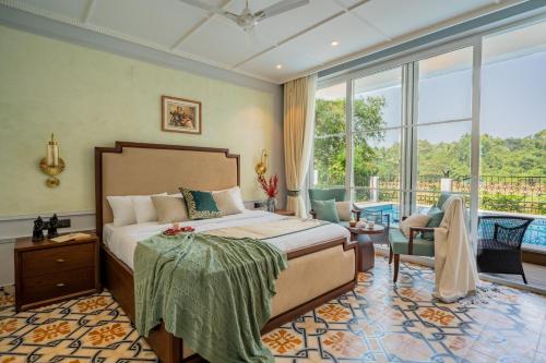 Postel nebo postele na pokoji v ubytování ELIVAAS 4 BHK with Pvt Pool - Suntuarios