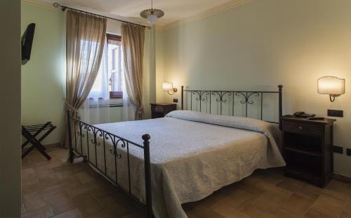 A bed or beds in a room at Il Pianaccio