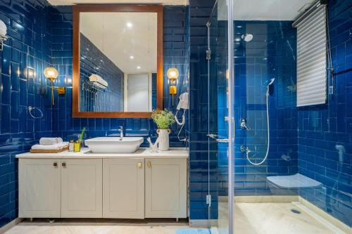 Koupelna v ubytování ELIVAAS 4 BHK with Pvt Pool - Suntuarios