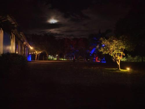 Taman di luar Sítio em Torres com Piscina e vista para Lagoa da Itapeva - Sítio Éden