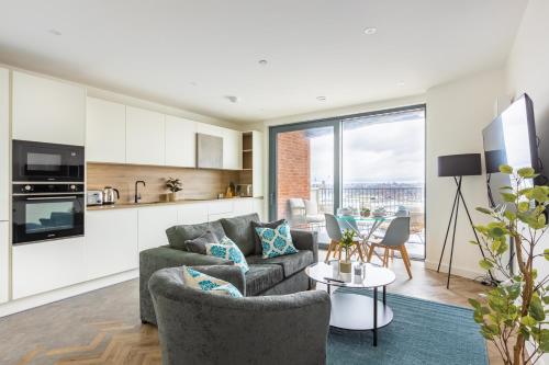 Svetainės erdvė apgyvendinimo įstaigoje Modern 2BD Flat in Canary Wharf With City and River Views