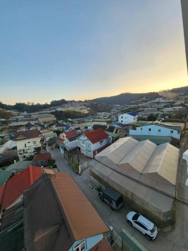 an aerial view of a city with buildings and cars at Happy Bun Hotel Da Lat in Da Lat