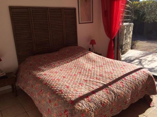 Ліжко або ліжка в номері Villa Cassis