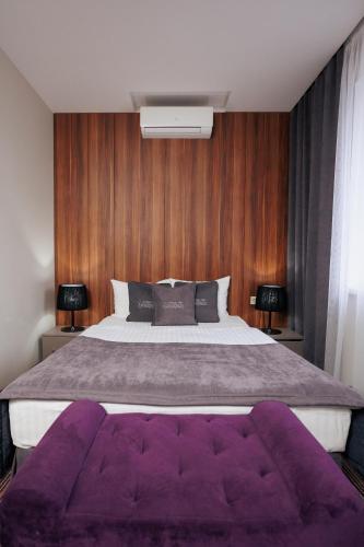 Katil atau katil-katil dalam bilik di Boutique Hotel Central