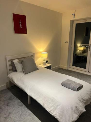 Ένα ή περισσότερα κρεβάτια σε δωμάτιο στο Luxurious 3-Bed Penthouse