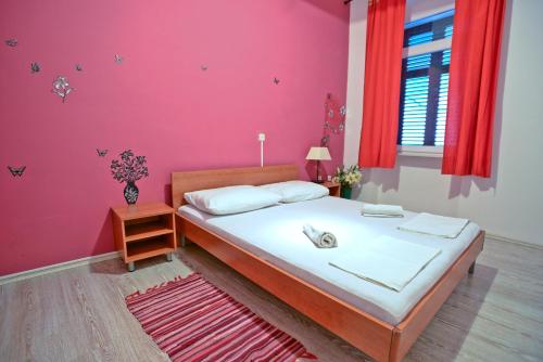Posteľ alebo postele v izbe v ubytovaní Epicenter Apartments Split