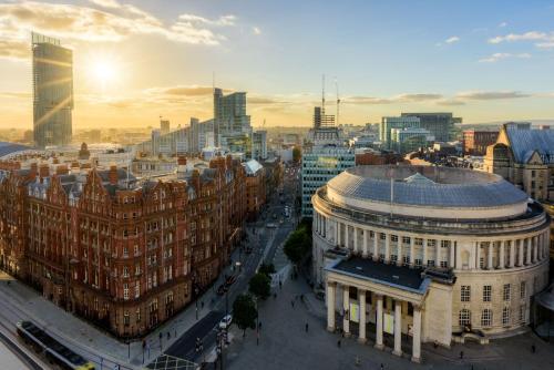 an aerial view of a city with tall buildings at Maldron Hotel Manchester Cathedral Quarter in Manchester