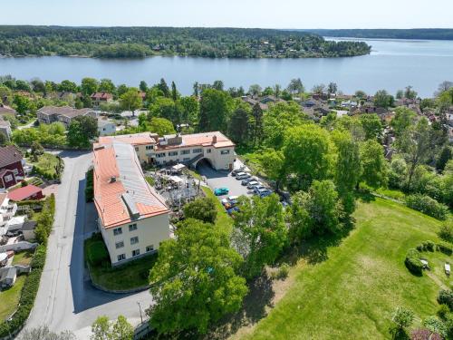 an aerial view of a town with a lake at Hotell Kristina in Sigtuna