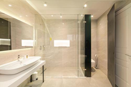 Koupelna v ubytování Lanterna Rooms City Center