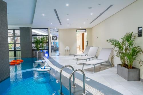Πισίνα στο ή κοντά στο Marlo Hotel - فندق مارلو