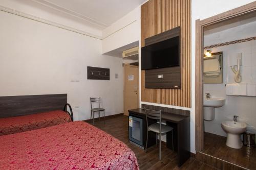 Koupelna v ubytování Hotel Piola