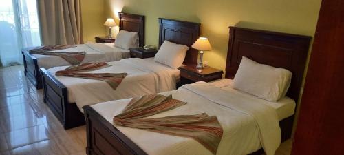 Ένα ή περισσότερα κρεβάτια σε δωμάτιο στο Sharm el shiekh sports city