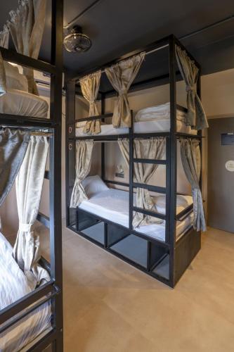 Letto o letti in una camera di Draper Startup House for Entrepreneurs Hyderabad