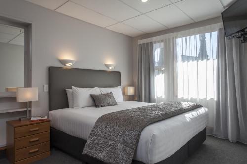 Postel nebo postele na pokoji v ubytování Amross Motel