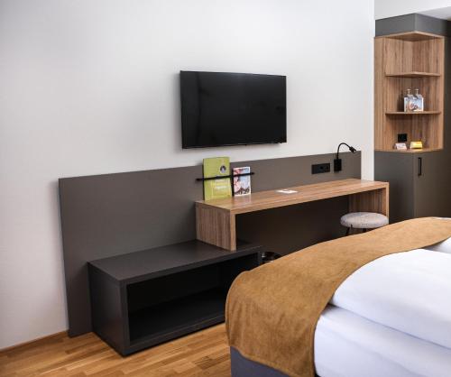 TV a/nebo společenská místnost v ubytování JUFA Hotel Bad Radkersburg - inkl 4h Thermeneintritt in Parktherme