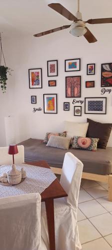 a bedroom with a bed and a table and chairs at Appartamento Alma de Cri 10b, Sal Rei Estoril in Sal Rei