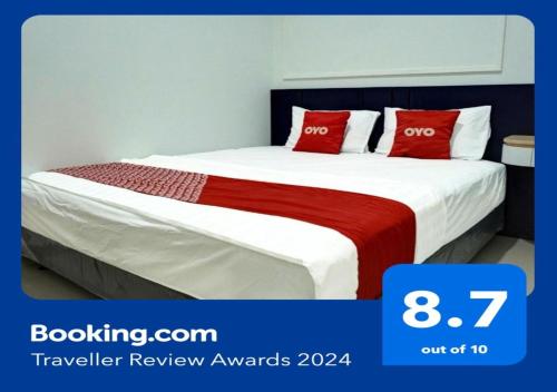 Ένα ή περισσότερα κρεβάτια σε δωμάτιο στο Capital O 92804 La Tansa Syariah Hotel