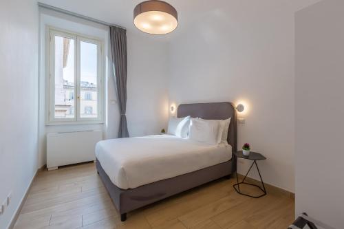 Cama o camas de una habitación en Oriana Homèl Roma