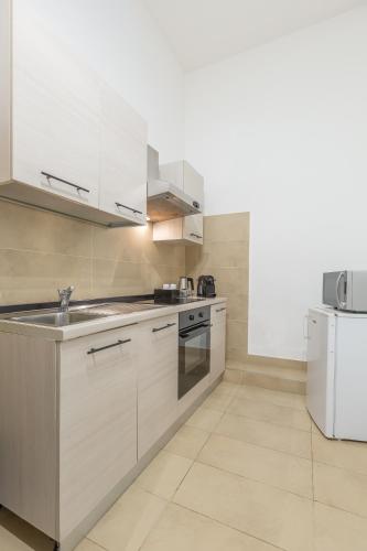 Una cocina o zona de cocina en Oriana Homèl Roma