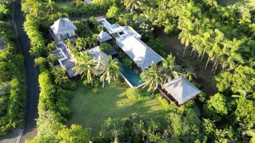 an overhead view of a mansion with palm trees at Villa Kaz' Grenadine in Bel Ombre
