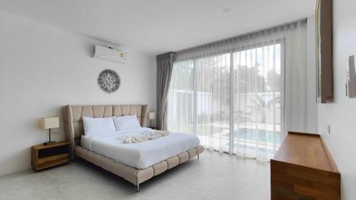 Postel nebo postele na pokoji v ubytování Villa Monaco