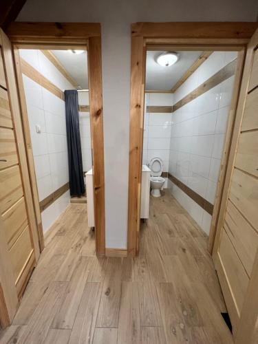 Ένα μπάνιο στο Domki Pszczółka