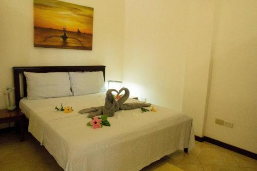 Katil atau katil-katil dalam bilik di Greenyard Inn