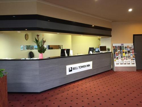 a large room with a large counter and a large window at Bell Tower Inn in Ballarat