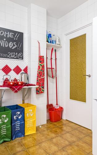 a kitchen with a door and some boxes on the floor at The Beach -Villa Mar- in Bolnuevo