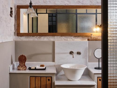a bathroom with a white sink and a mirror at Not Boutique Hotel in Athens