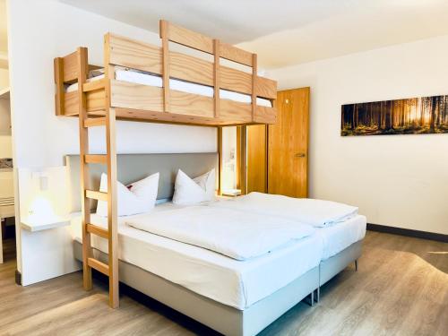 Postel nebo postele na pokoji v ubytování Hotel Günter