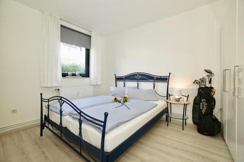 Ένα ή περισσότερα κρεβάτια σε δωμάτιο στο Ferienwohnung Glücksmoment