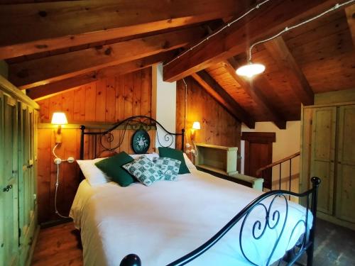 Postel nebo postele na pokoji v ubytování Baita Gran Monte