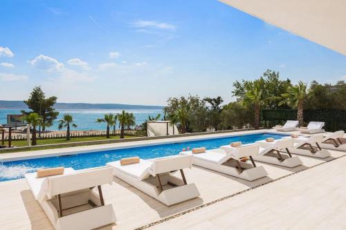 Exclusive Villa Calma I - heated pool&spa sea view