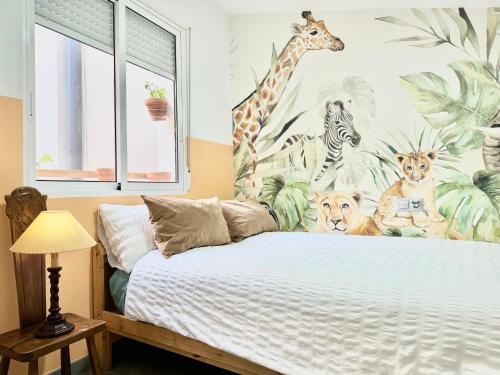 Кровать или кровати в номере NUEVO Casco Antiguo, playa y castillo