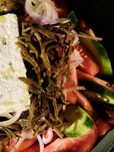 a bowl of food with vegetables and sidx sidx sidx sidx at Not Boutique Hotel in Athens