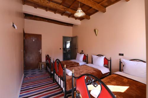 Cama o camas de una habitación en Tamatert Guest House