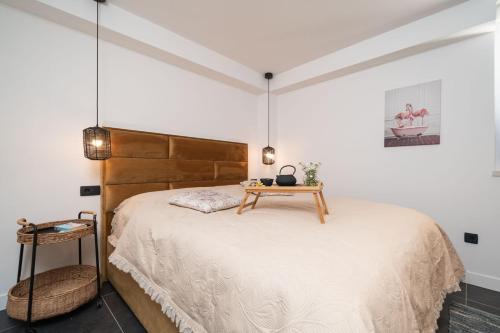 Postel nebo postele na pokoji v ubytování Apartments Alex