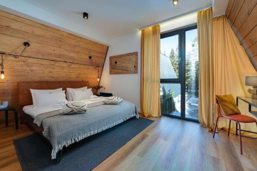 Ένα ή περισσότερα κρεβάτια σε δωμάτιο στο Villa Bellis