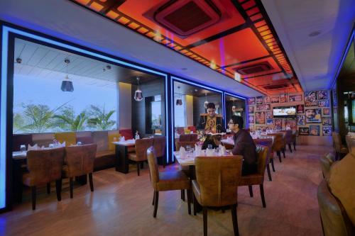 Un restaurante u otro lugar para comer en Hotel Alleviate